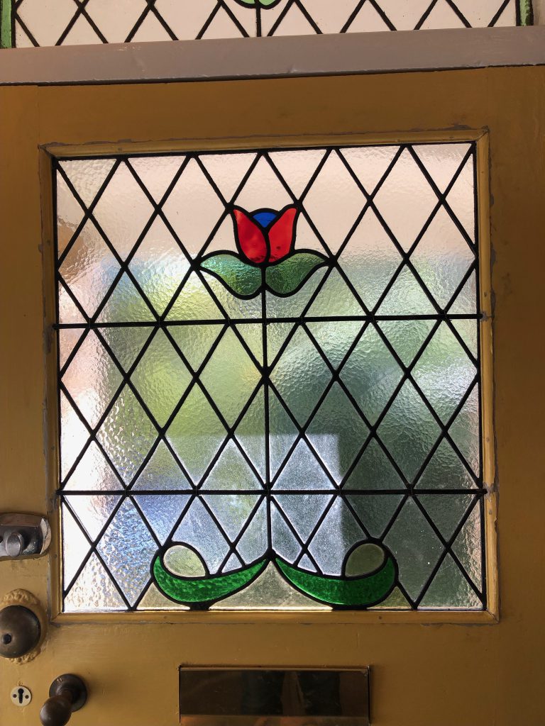 Commission stained glass door diamond tulip red