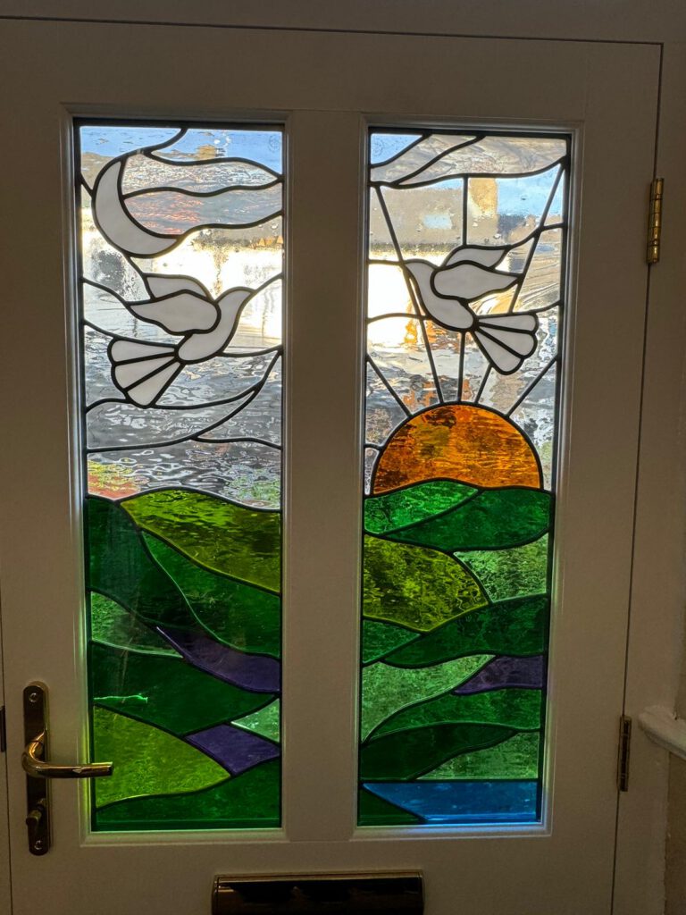 Commission stained glass door doves sunrise