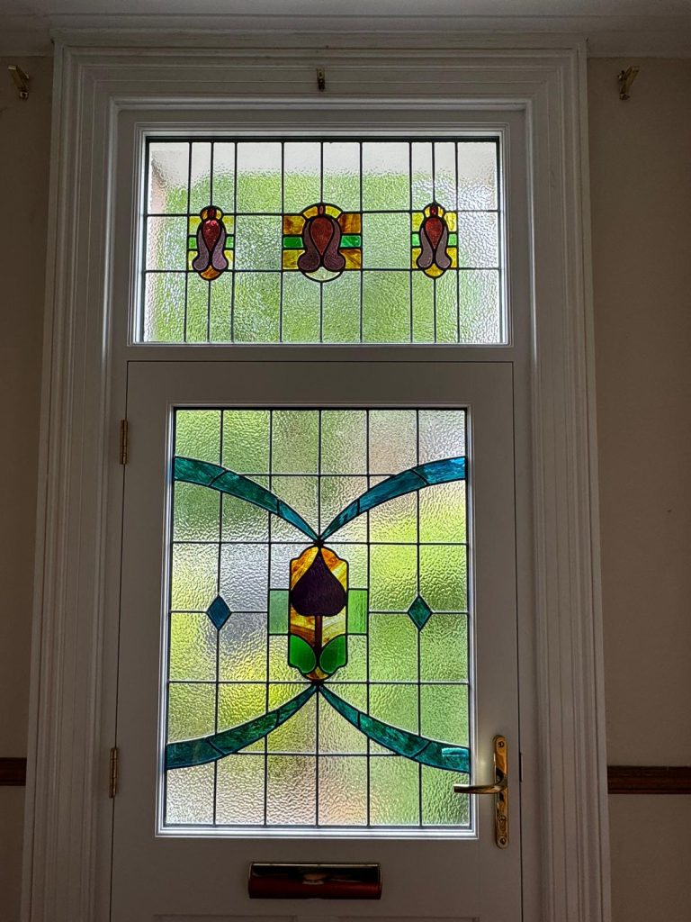 Commission stained glass door fanlight art nouveau teal installed