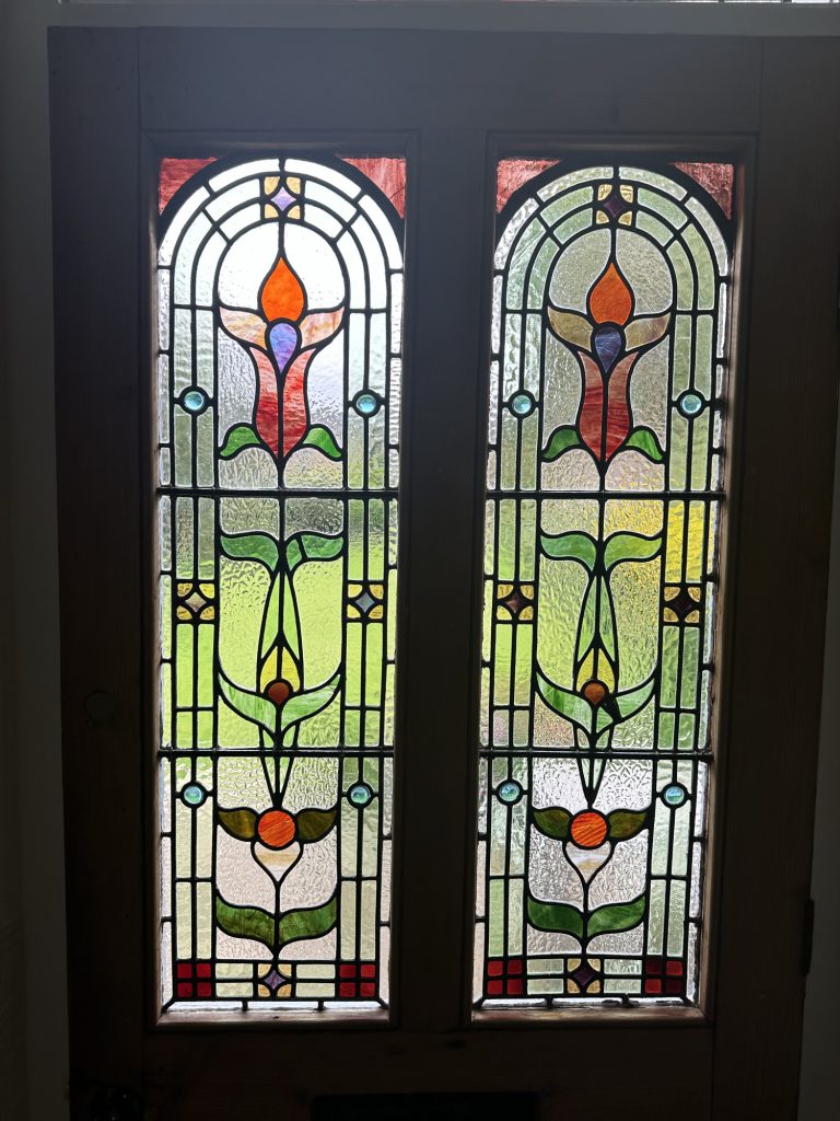 Commission stained glass door panels arched art nouveau tulip lily