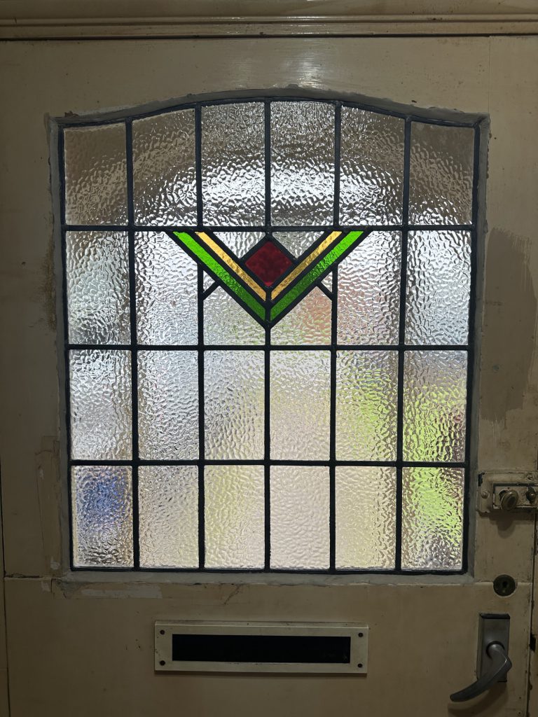 Commission stained glass door window art deco chevron green red