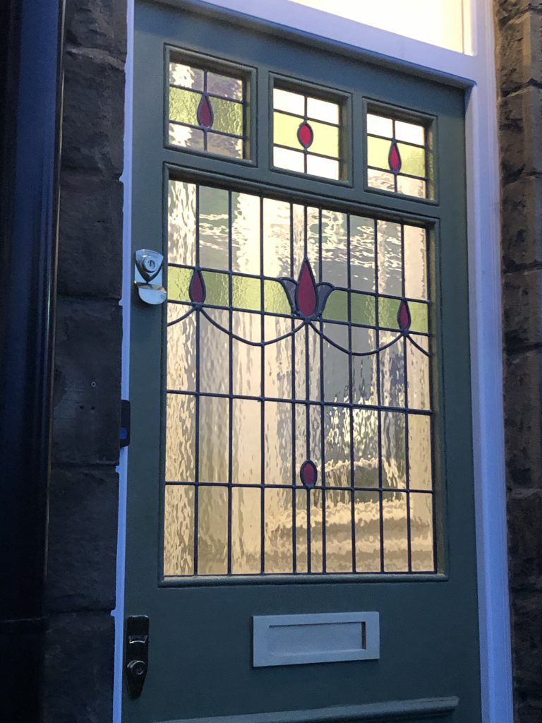 Commission stained glass front door red tulip swag green