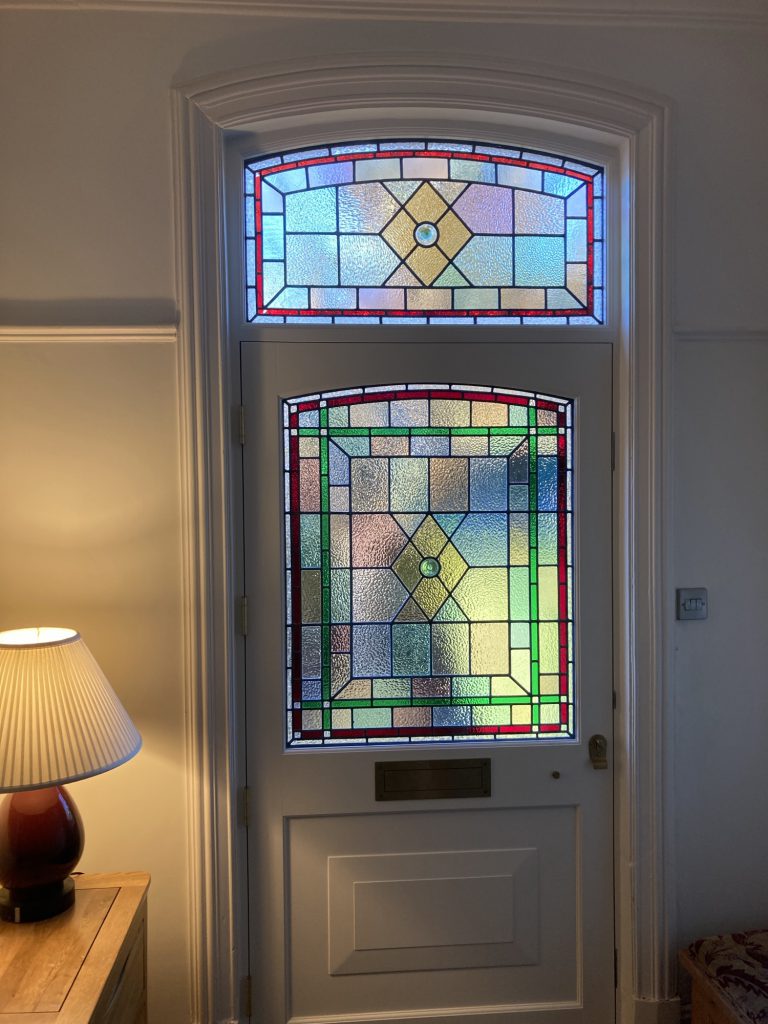 Commission stained glass iridescent door diamond fanlight hallway