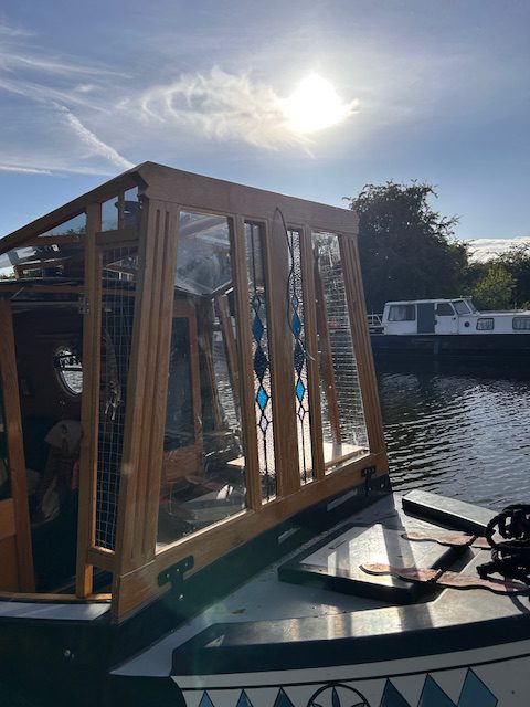 Commission stained glass narrowboat installed canal