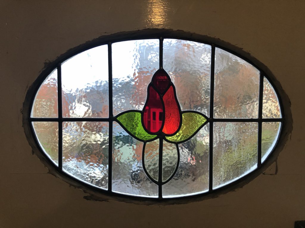 Commission stained glass oval window red rose bud