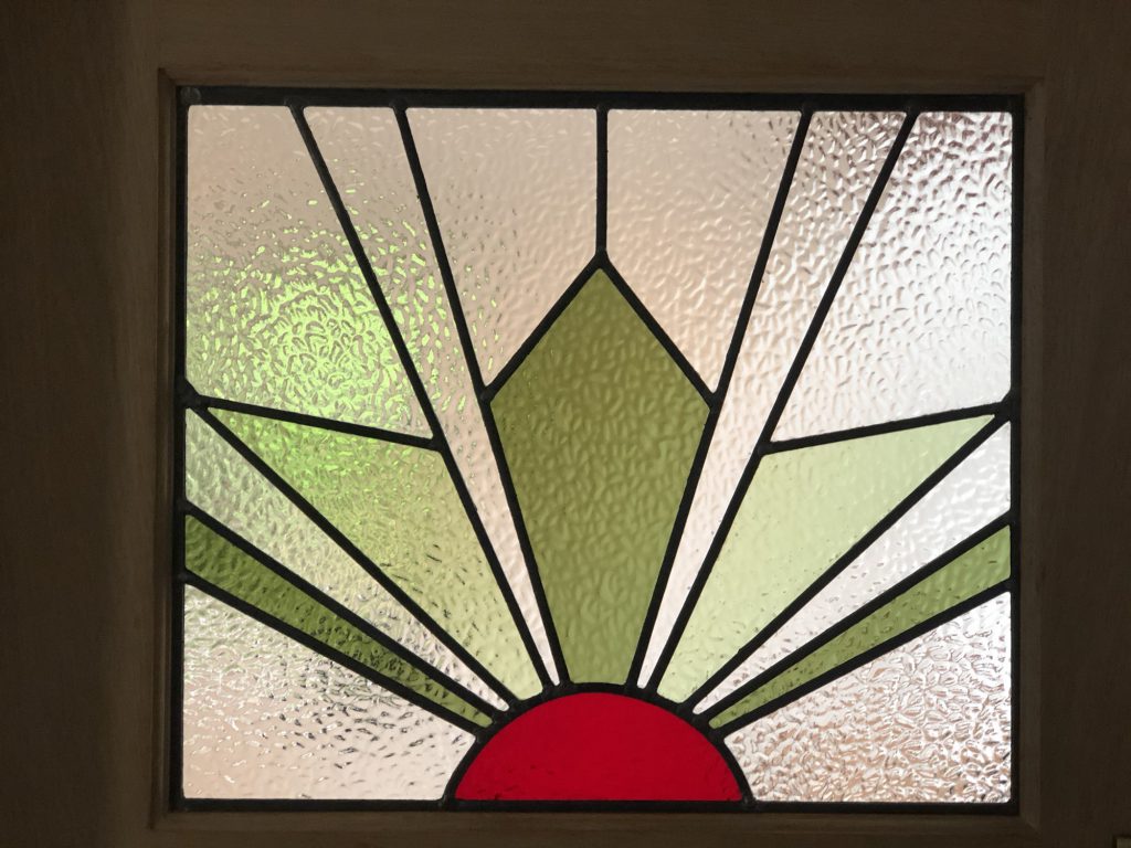 Commission stained glass window art deco sunburst green red