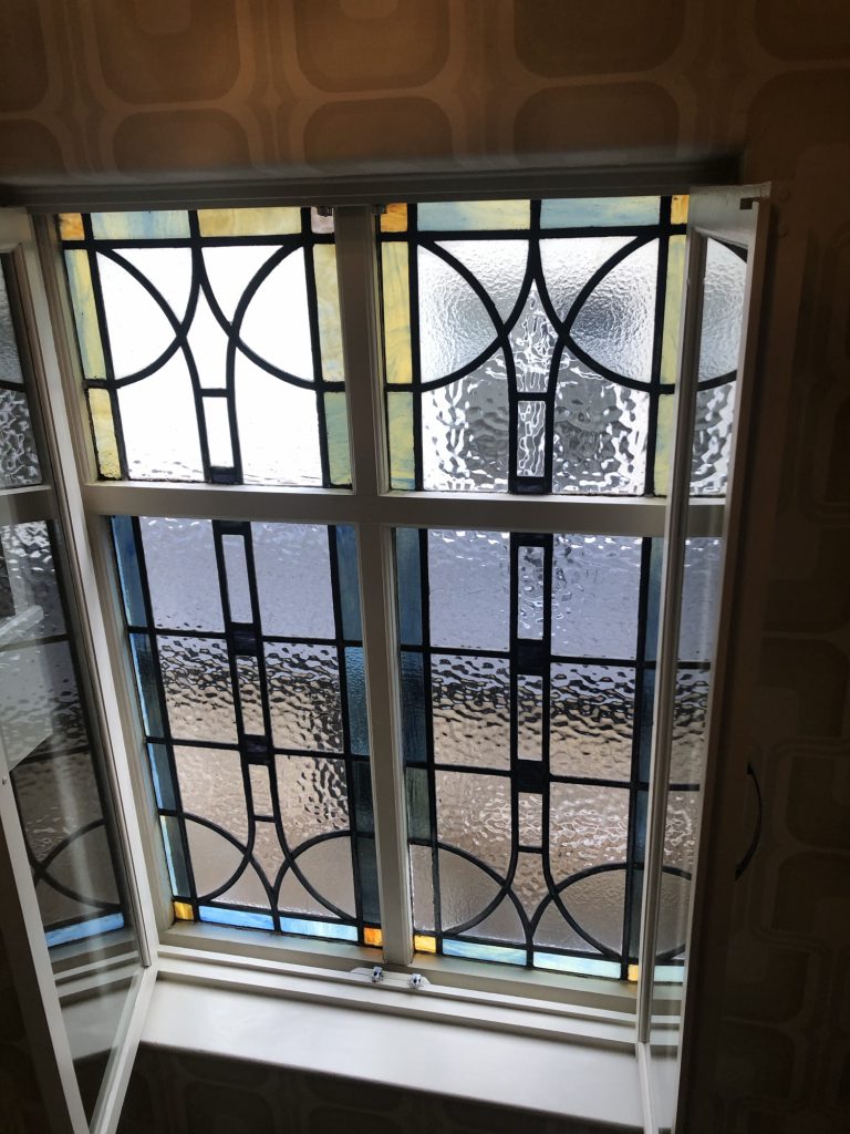Commission stained glass window geometric art deco circles