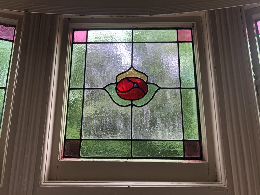 Commission stained glass window red poppy bay