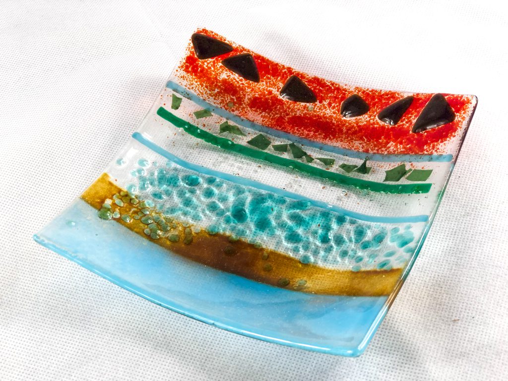 Fused glass dish striped orange teal