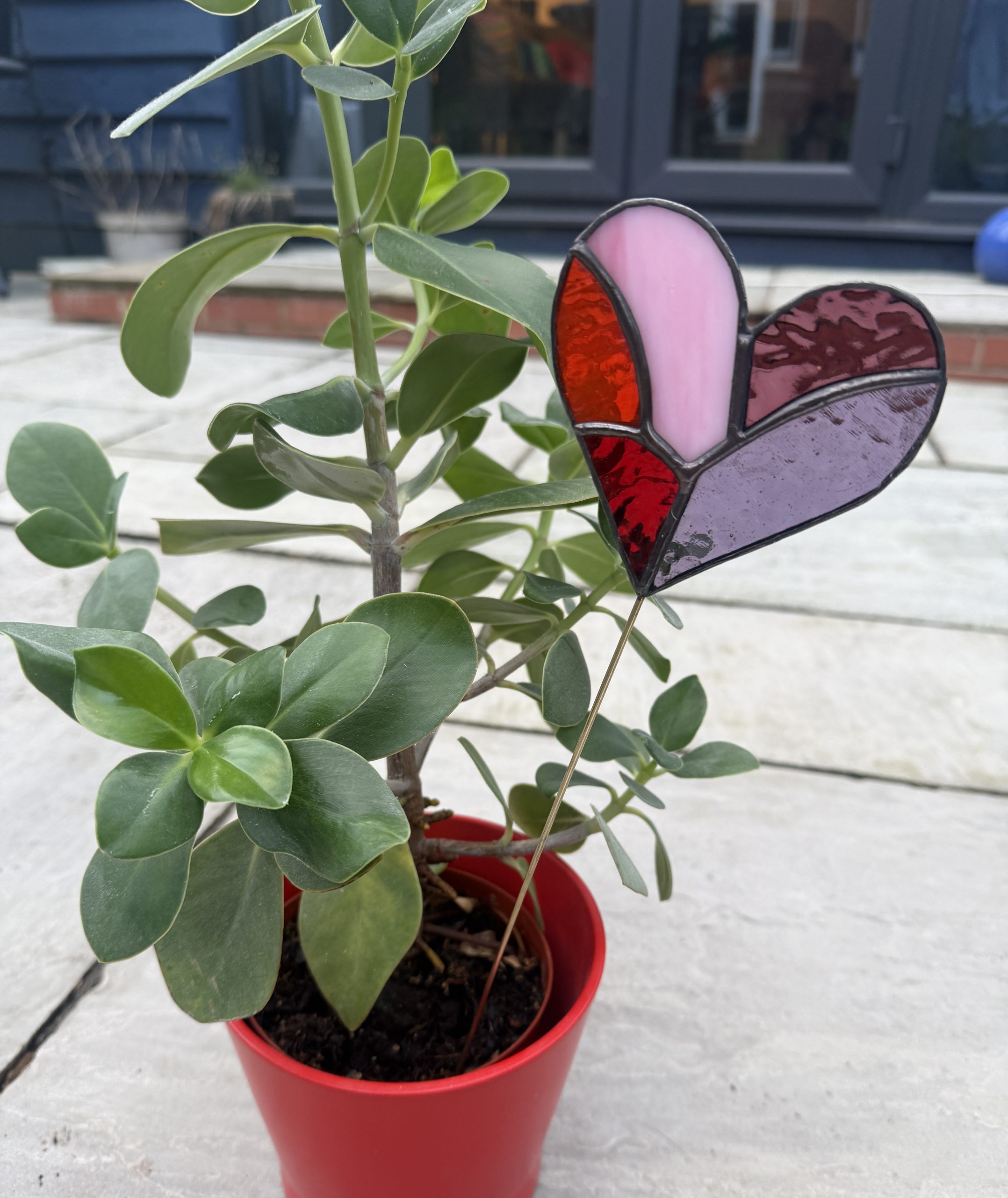Pink and red stained glass heart plant stake