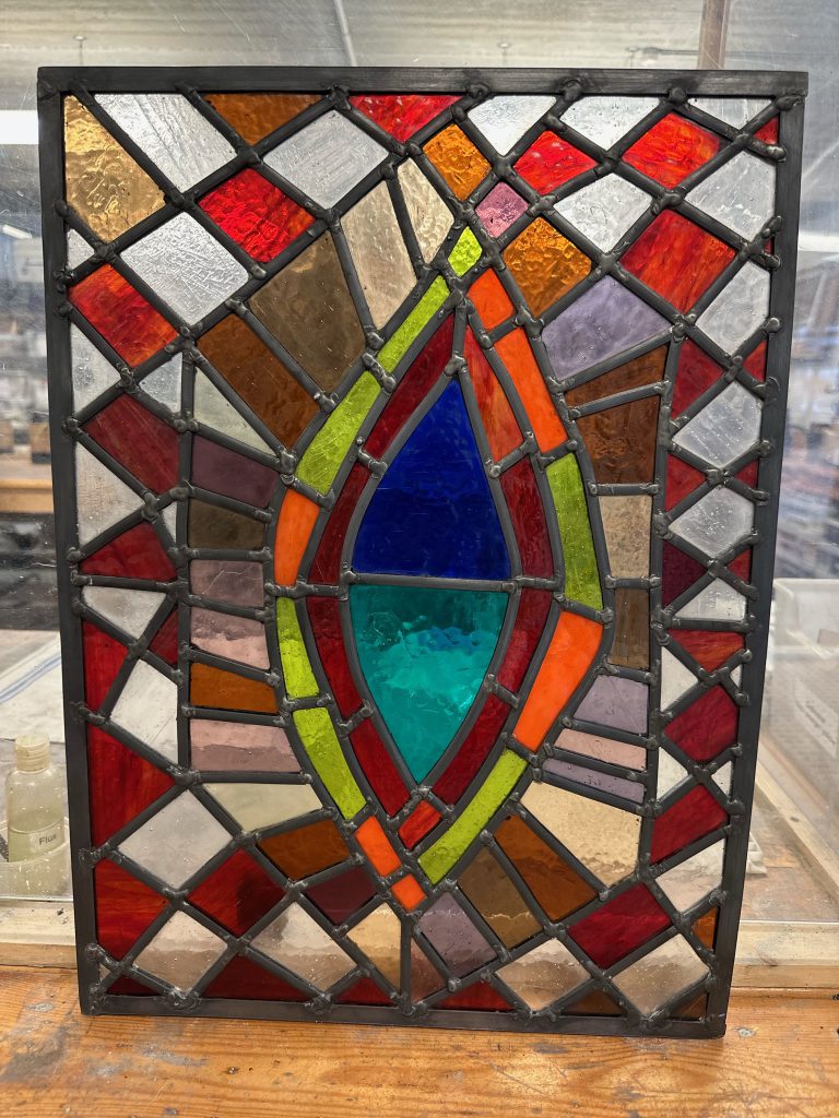 Stained glass abstract eye mosaic panel