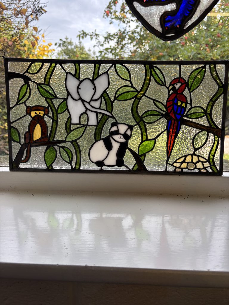 Stained glass animals jungle panel