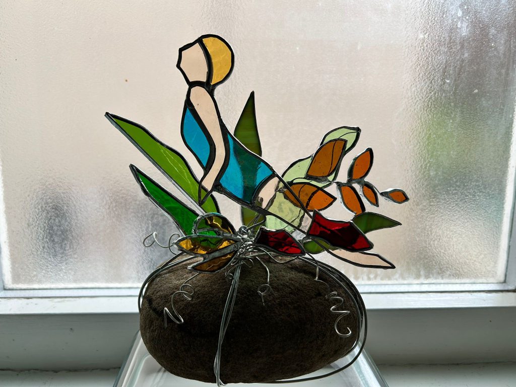 Stained glass botanical pebble sculpture