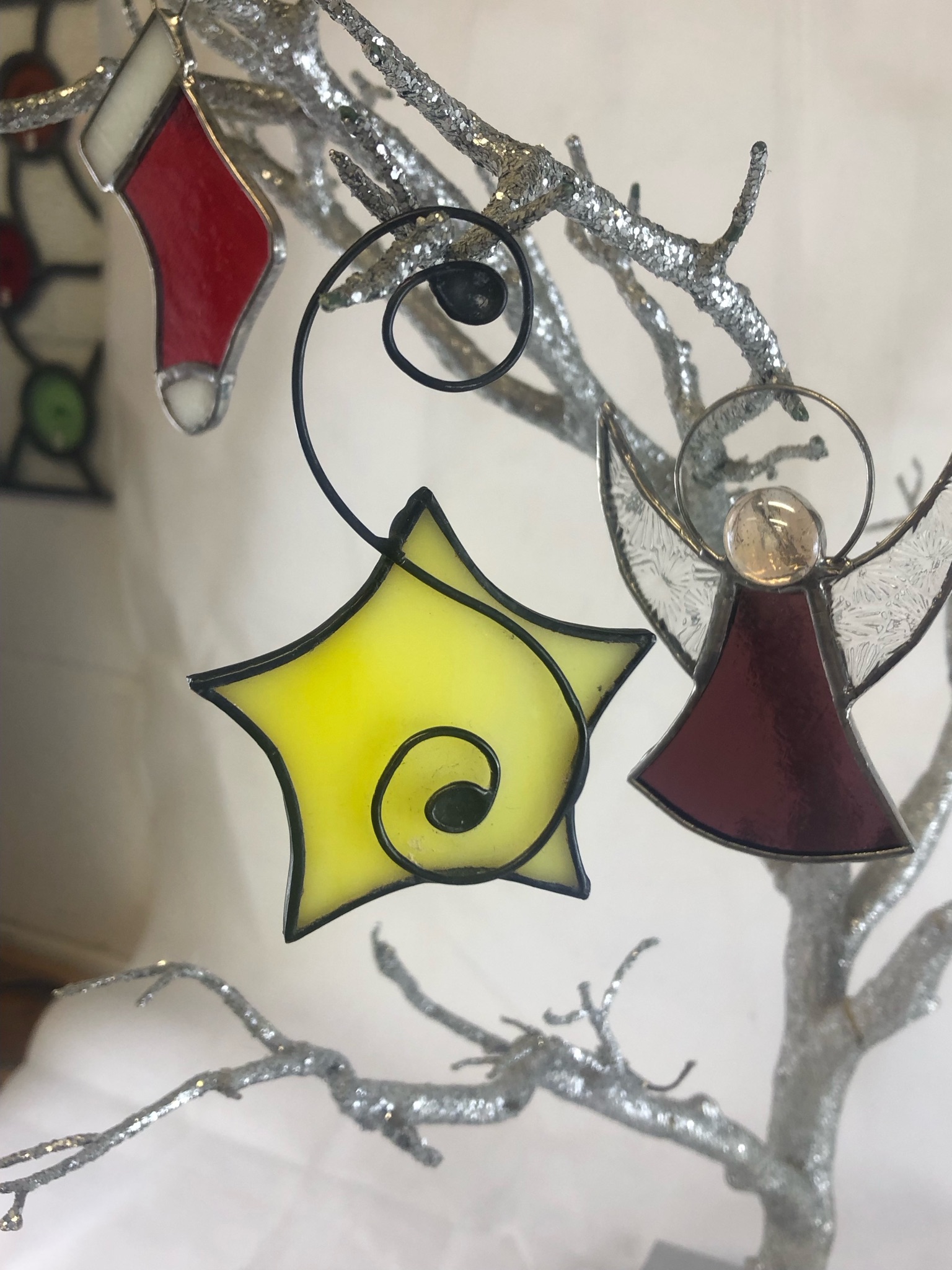 Stained glass Christmas ornaments display