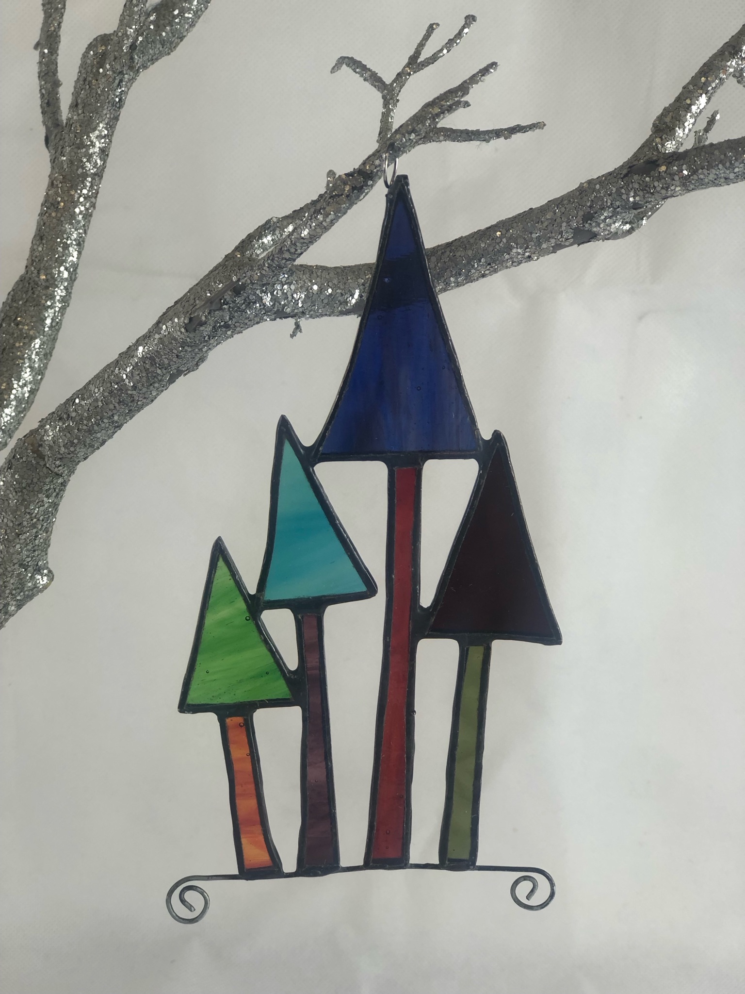Set of four stained glass Christmas trees