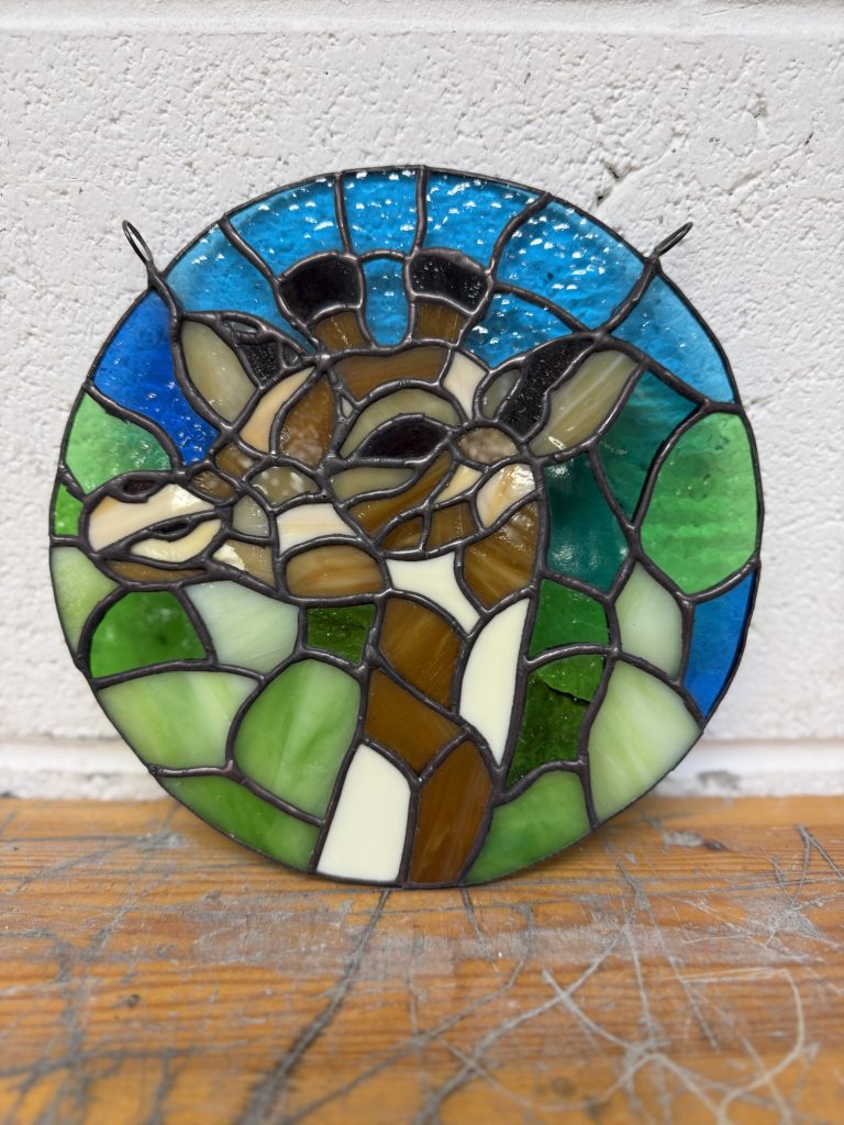 Stained glass giraffe circular panel