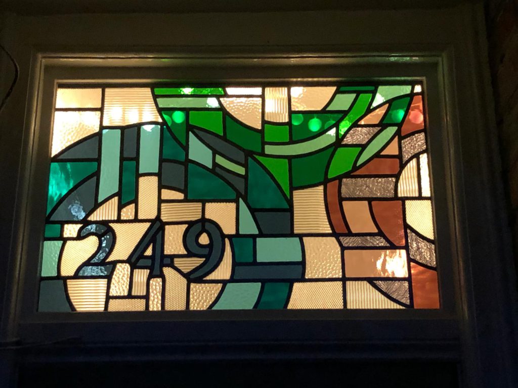 Stained glass house number 249 door panel