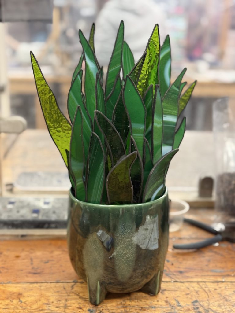 Stained glass snake plant sculpture