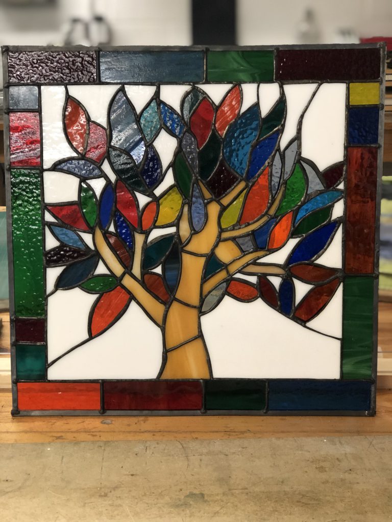 Stained glass tree of life multicolour leaves