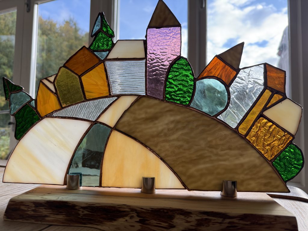 Stained glass village castle skyline sculpture