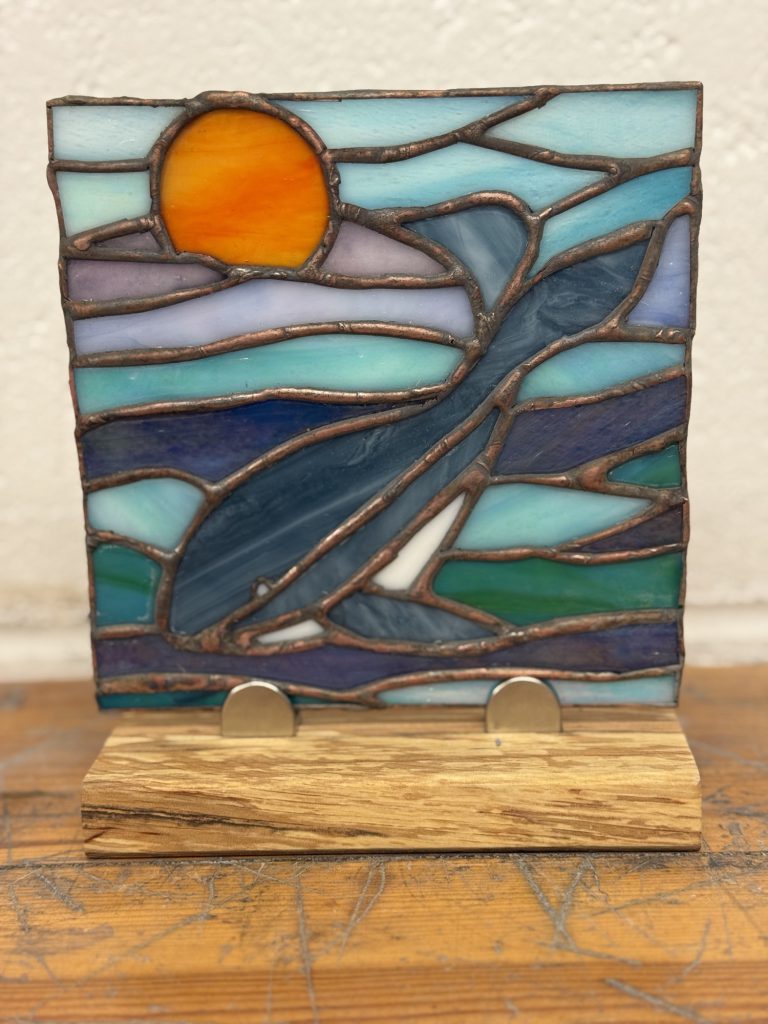 Stained glass whale ocean sunset panel