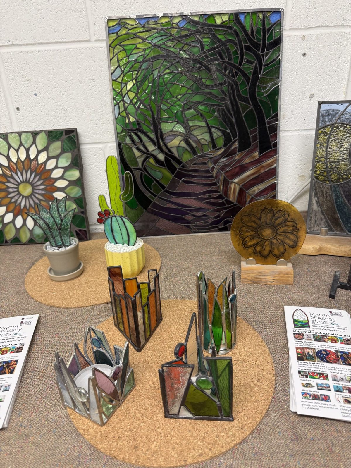 stained glass workshop glass pieces table