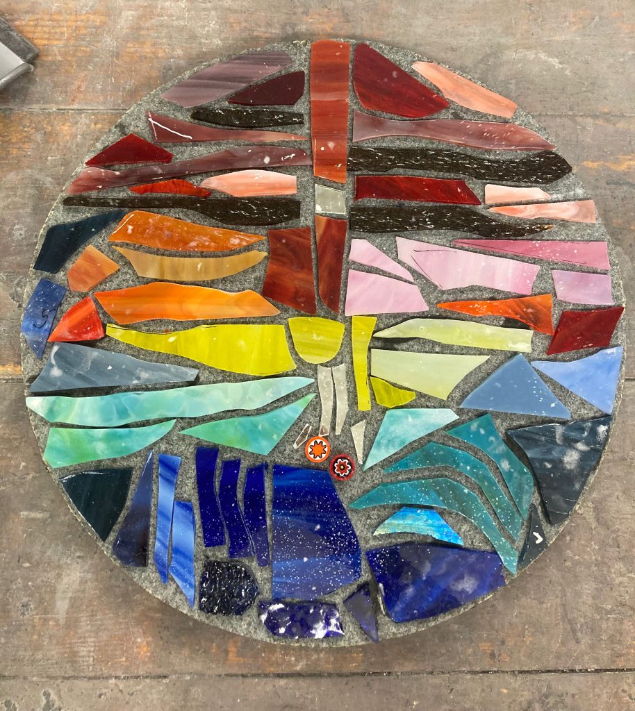 Student mosaic circular bold cross colourful