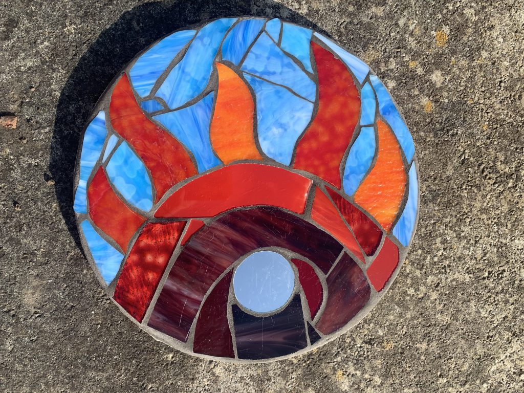 Student mosaic stepping stone fire