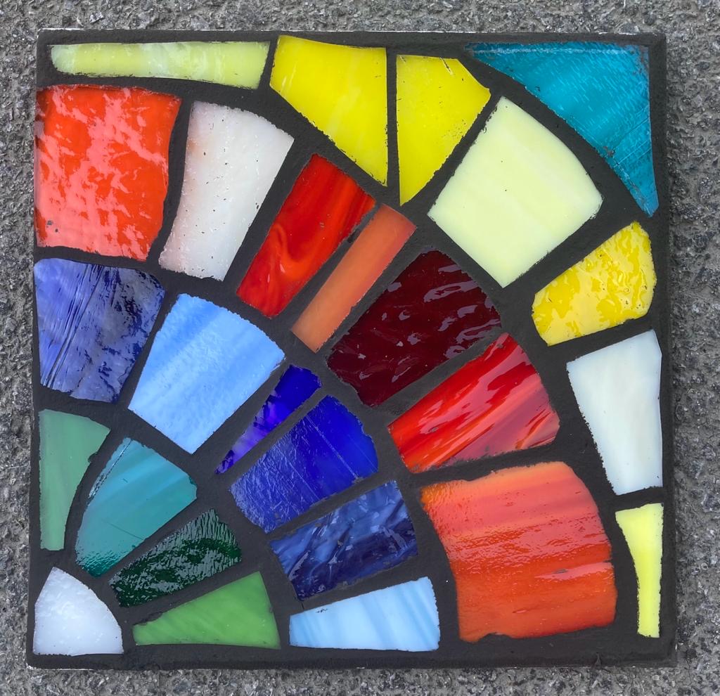 Student mosaic stepping stone fire water