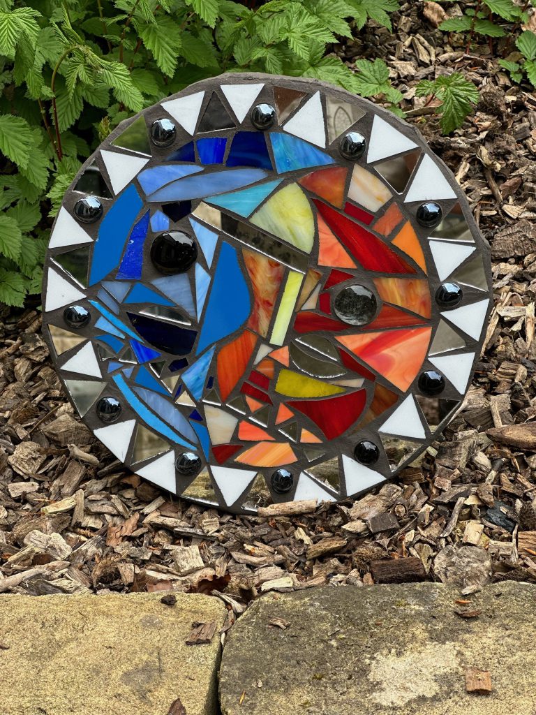 Student mosaic stepping stone sun moon face