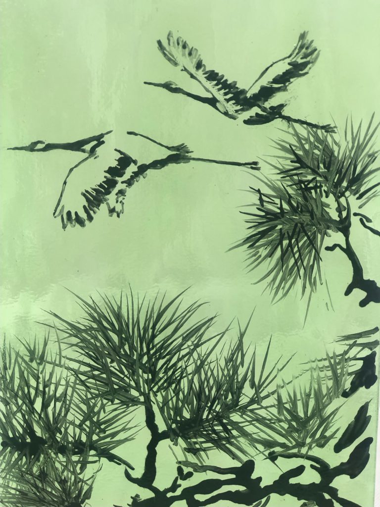Student painted glass japanese cranes pine trees