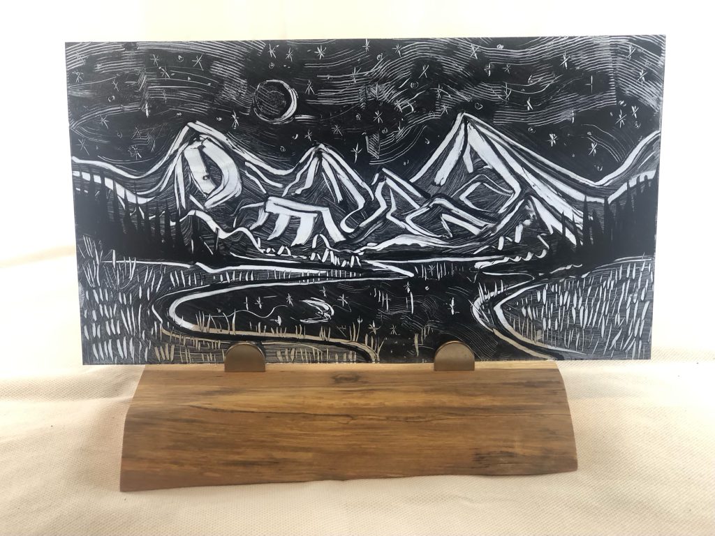 Student painted glass mountain night scene