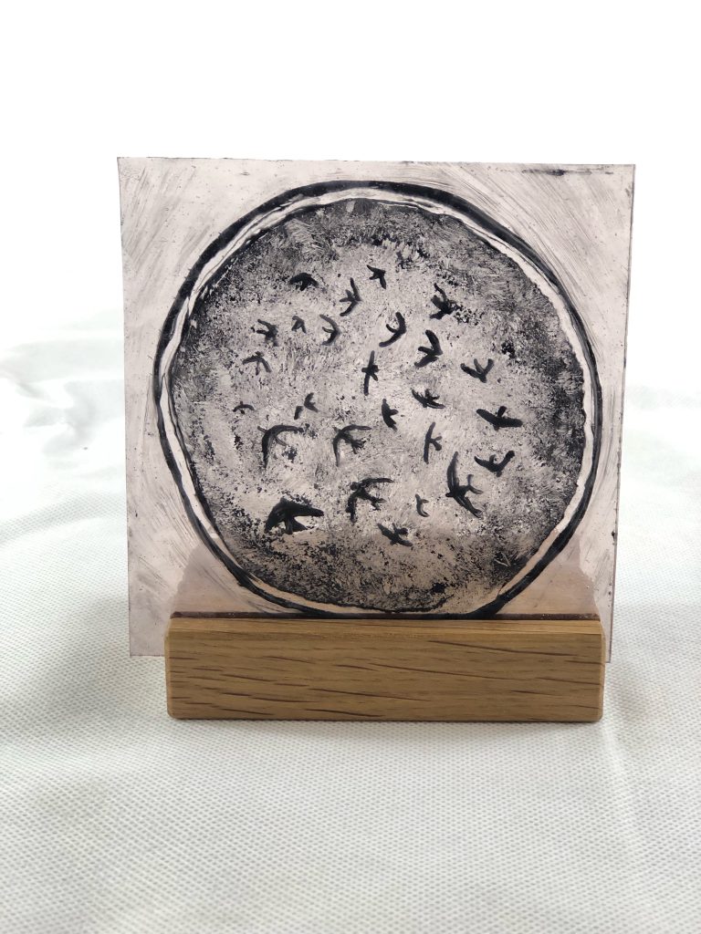 Student painted glass swallows flock circular monochrome