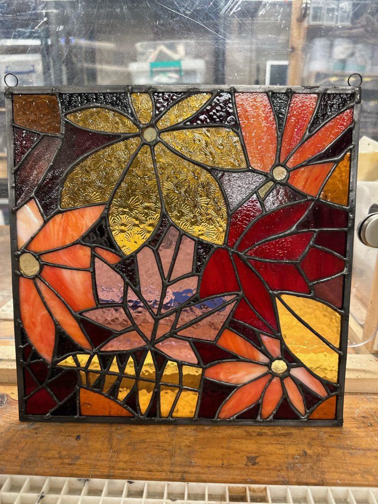 Student stained glass flower mosaic bold warm panel
