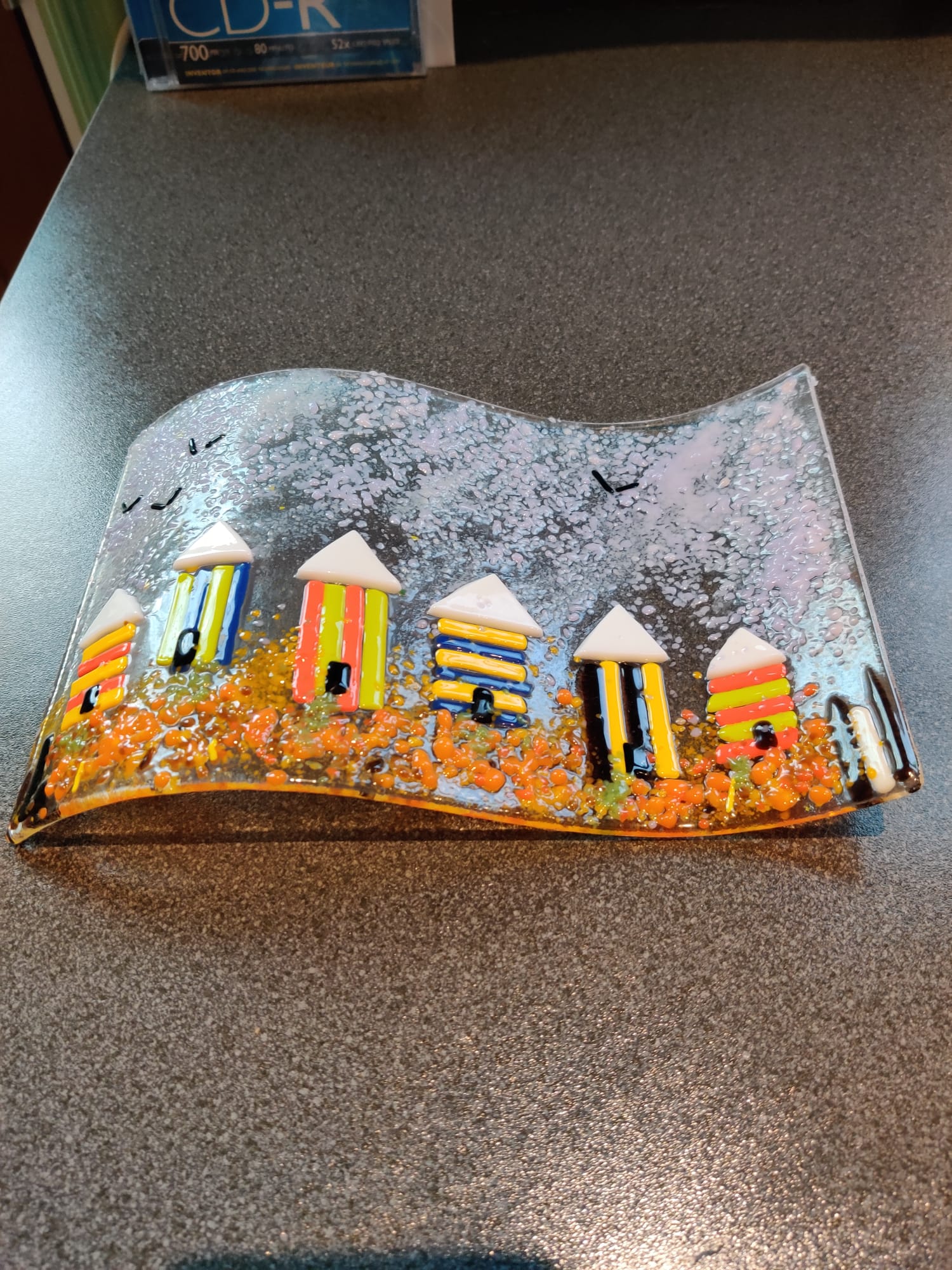 Fused glass wave panel — colourful beach huts by the sea