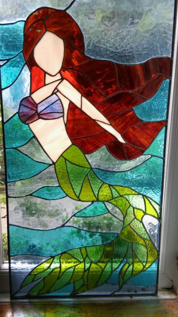 Student stained glass mermaid panel