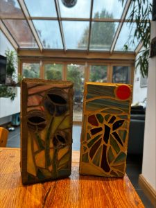 Student garden block mosaic with sunflower and sunset design